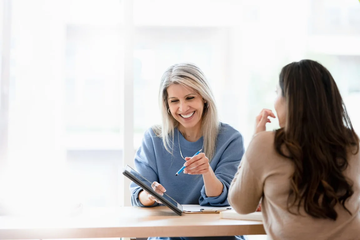 An adviser meeting with a client