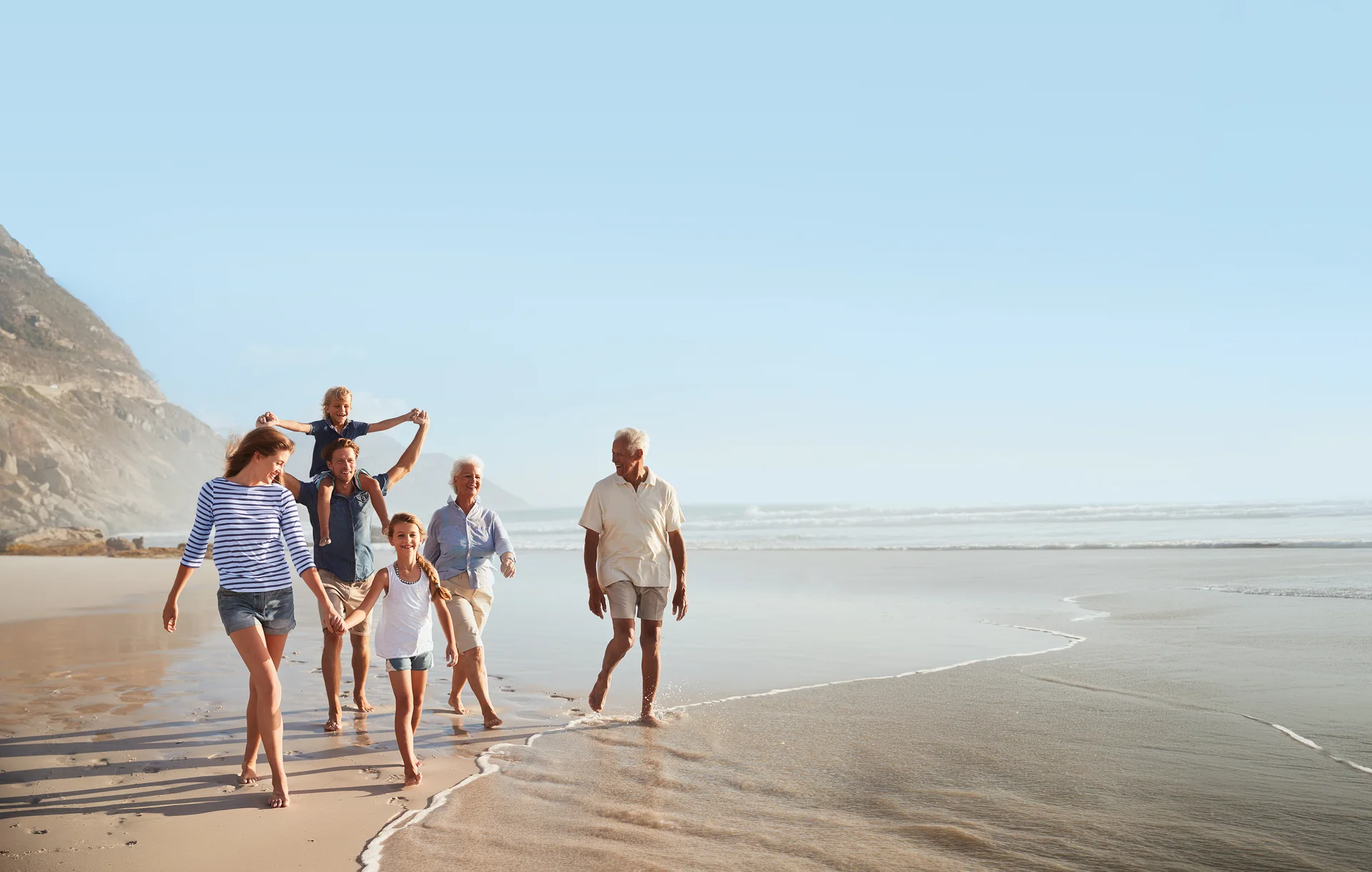 A family walking together on an Australian beach